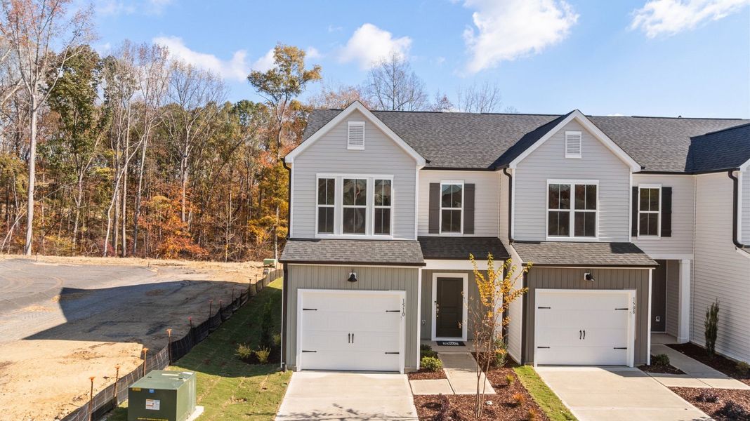 Front exterior of a new home in Flemingfield, Greensboro, NC, highlighting curb appeal (Image 2). Front exterior of a new home in Flemingfield, Greensboro, NC, highlighting curb appeal (Image 2).