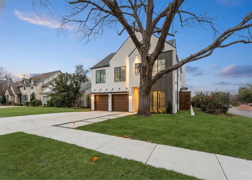 Front exterior of a new home in , Dallas, TX, highlighting curb appeal (Image 20).