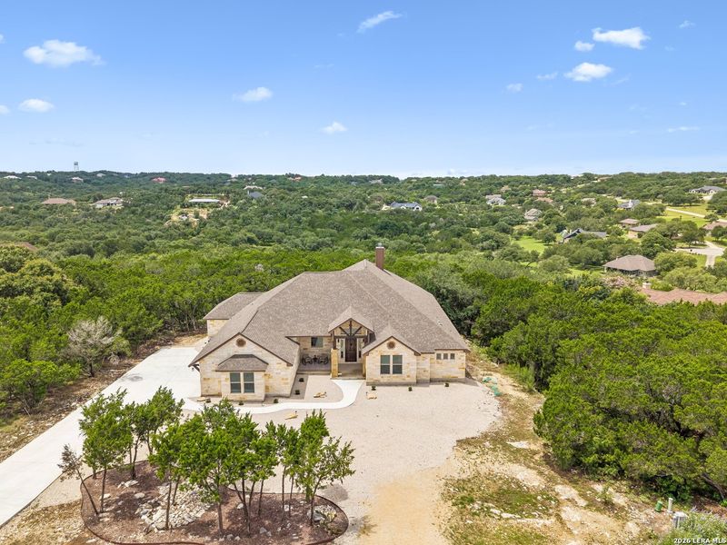 Front exterior of a new home in , New Braunfels, TX, highlighting curb appeal (Image 1). Front exterior of a new home in , New Braunfels, TX, highlighting curb appeal (Image 1).