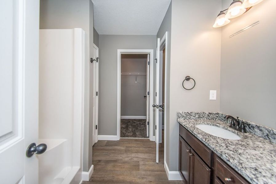 Representative furnished interior of a home built from the Archer by Enchanted Homes in Lonesome Dove, San Antonio (Image 17).