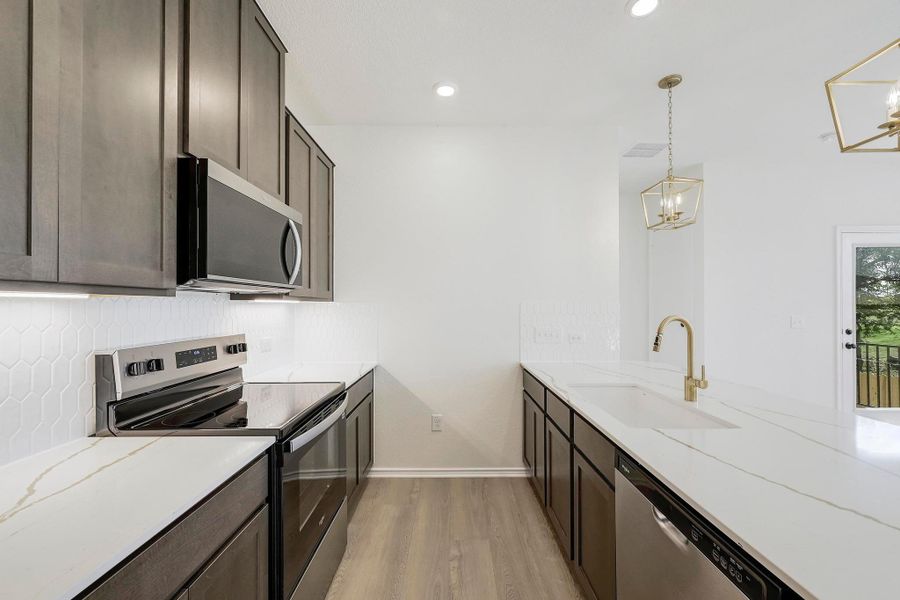 Furnished interior view inside a new home in Creekside at Estancia, Austin (Image 4).