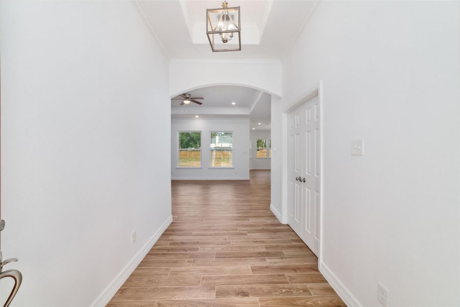Front entryway with high ceilings. Office door to the right. Directly ahead is the main living areas. Front entryway with high ceilings. Office door to the right. Directly ahead is the main living areas.