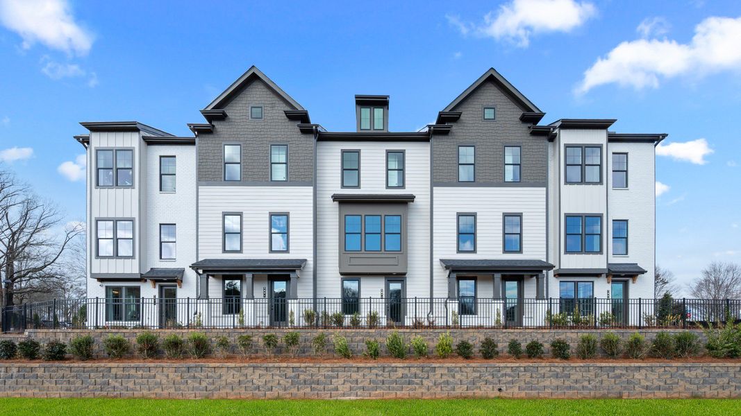Representative exterior photo of a completed home built from the Seaton - Dual Primary Suite by DRB Homes in Barrett Pointe, Kennesaw, GA (Image 21).