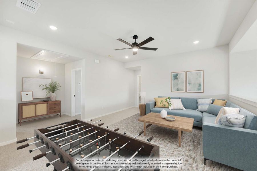 Game room with foosball table, sectional sofa, ceiling fan, and carpet flooring