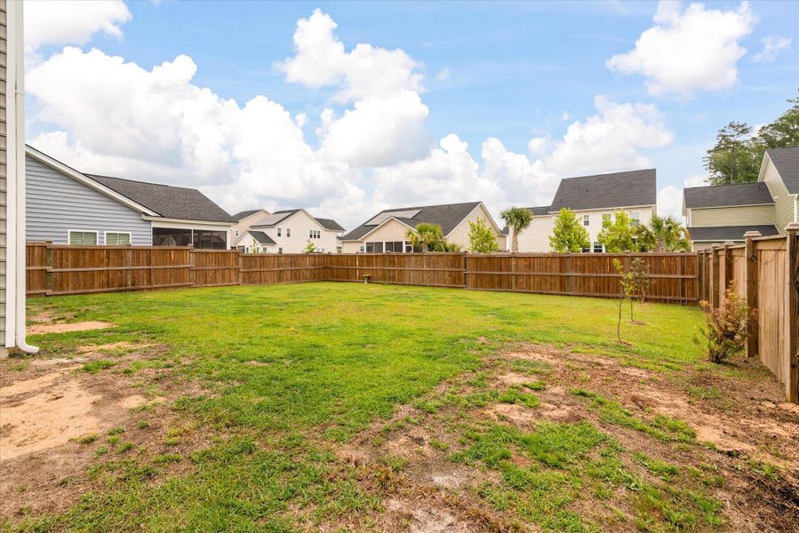 Exterior details and patio area of a home in Sweetgrass at Summers Corner, Summerville (Image 31).