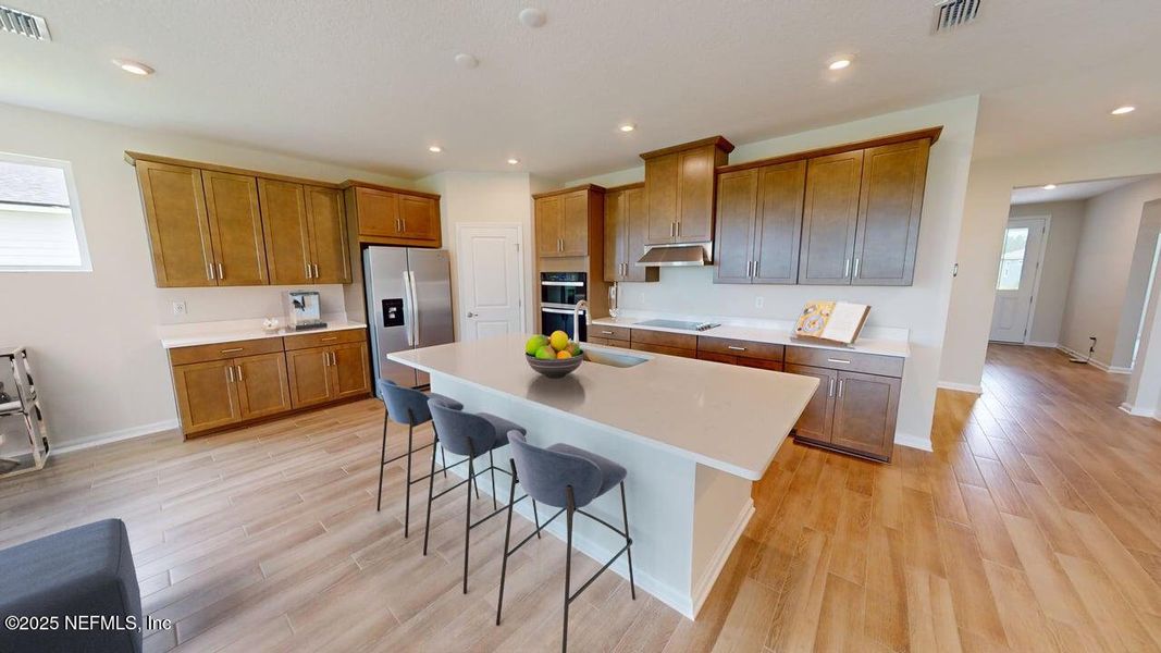 Furnished interior view inside a new home in Lakes at Bella Lago, Green Cove Springs (Image 8).