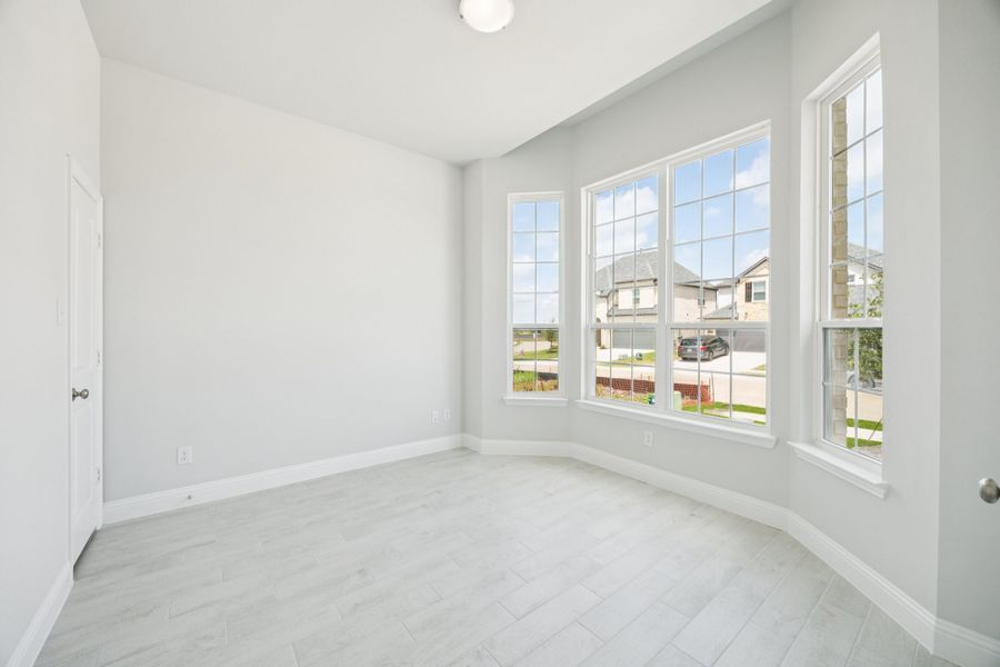 Representative unfurnished interior of a home built from the Regency II by Megatel Homes in Bellagio, Forney (Image 8).