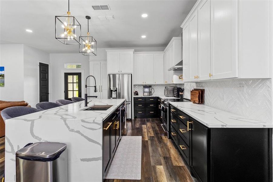 Lots of beautiful quartz counter space and so much storage!