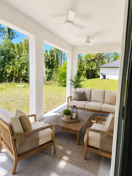 Exterior details and patio area of a home in , Lehigh Acres (Image 4).