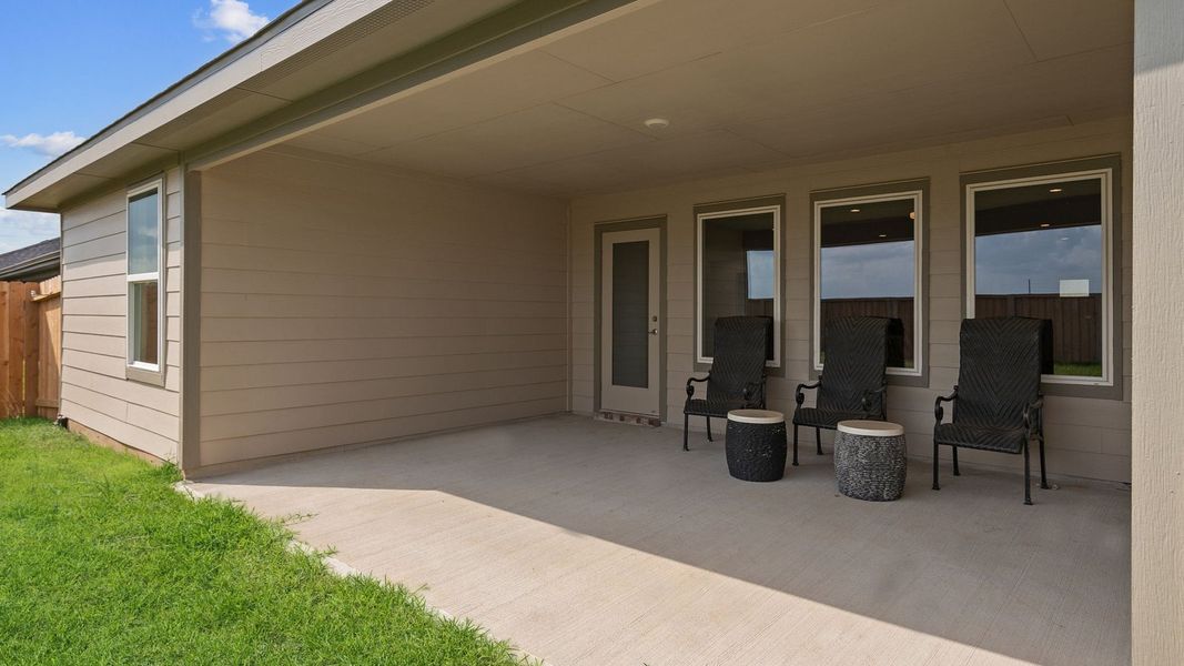 Exterior details and patio area of a home in Tamarron, Fulshear (Image 3). Exterior details and patio area of a home in Tamarron, Fulshear (Image 3).