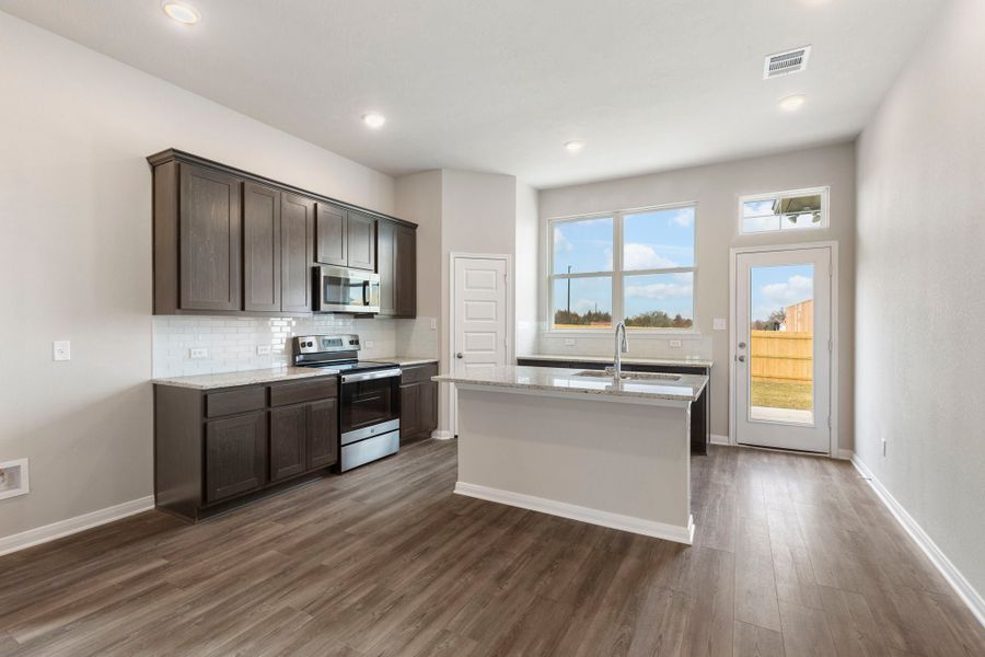 Representative furnished interior of a home built from the The 1475 by Stylecraft Builders in Arroyo Ranch, Seguin (Image 5).