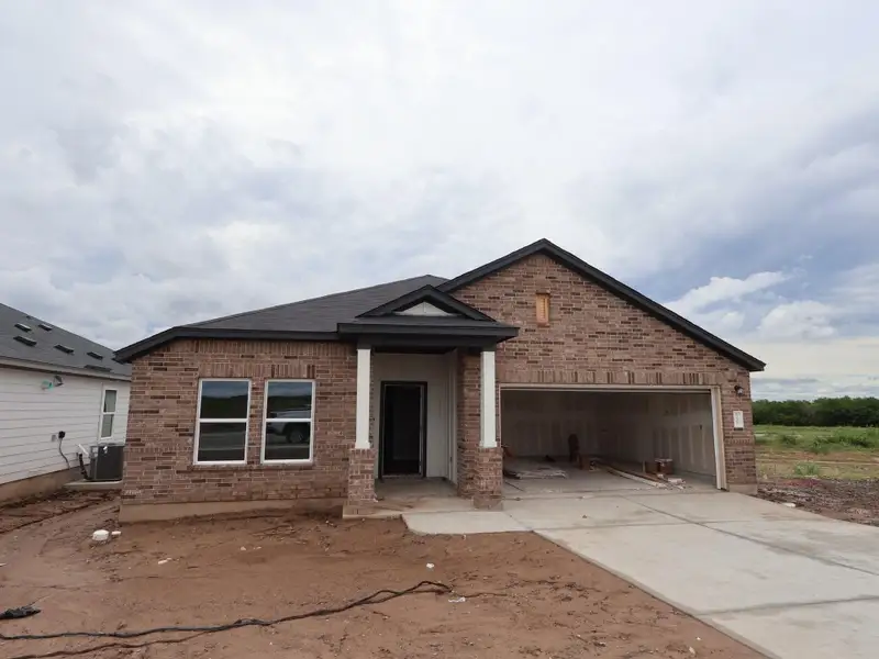 In-progress construction of a new home in Willow Springs, Buda, TX (Image 4).