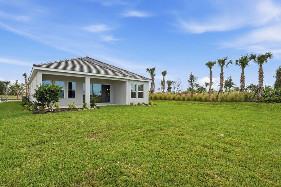Exterior details and patio area of a home in Esplanade at Coasterra, Palmetto (Image 22).