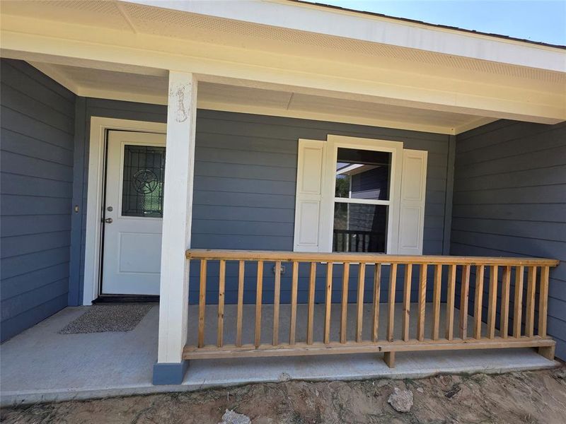 Doorway to property with a porch