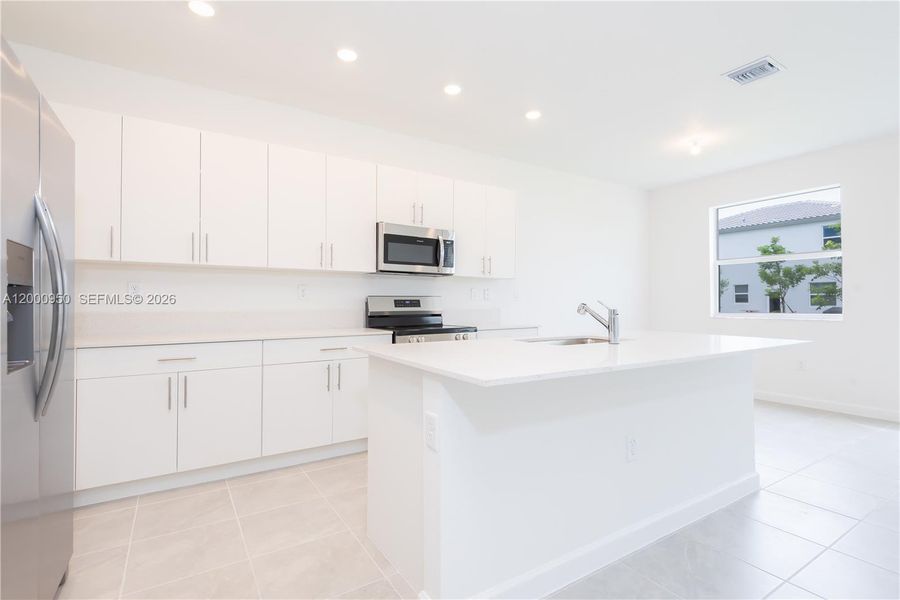 Furnished interior view inside a new home in , Homestead (Image 3). Furnished interior view inside a new home in , Homestead (Image 3).