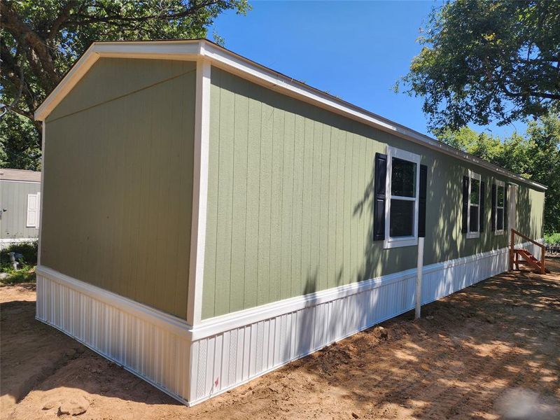 Exterior details and patio area of a home in , Gun Barrel City (Image 16).