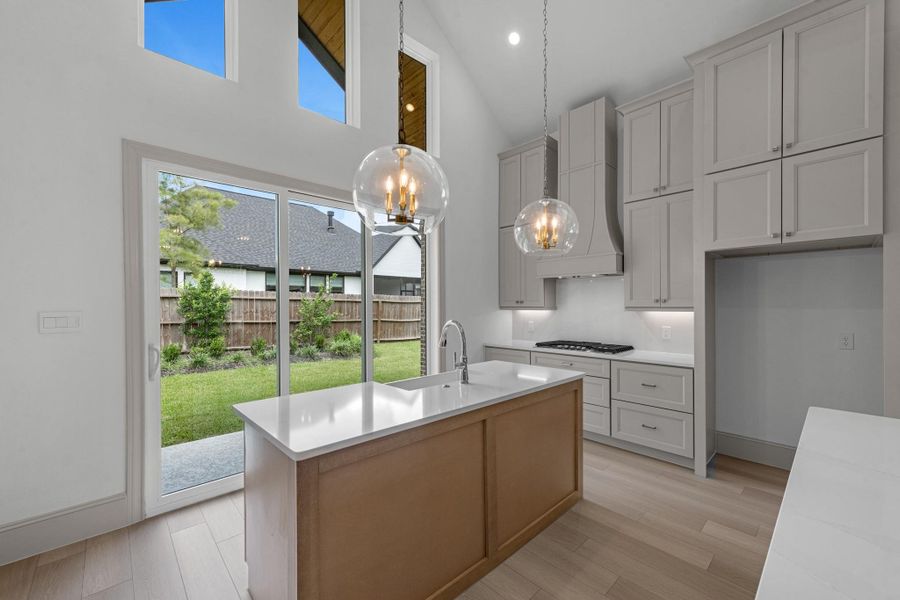 Pendant lighting plus under cabinet lighting provide a luxurious tone in the kitchen. Pendant lighting plus under cabinet lighting provide a luxurious tone in the kitchen.