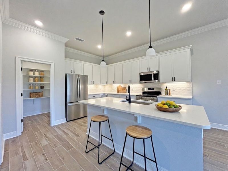 Furnished interior view inside a new home in Natureview, Freeport (Image 6).
