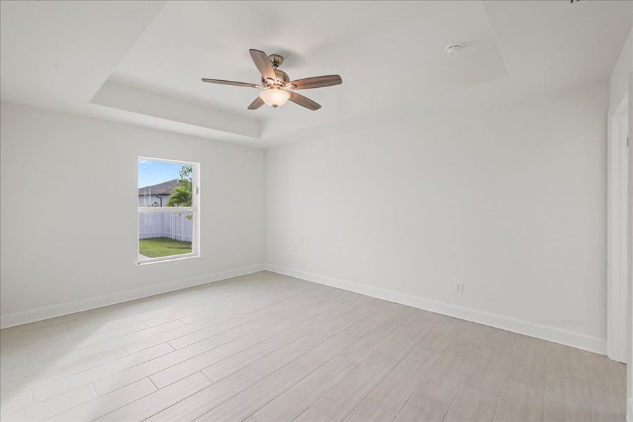 Representative unfurnished interior of a home built from the The Sunset Harbor with Pool by Sunlife Homes LLC in Cape Coral, Cape Coral (Image 32). Representative unfurnished interior of a home built from the The Sunset Harbor with Pool by Sunlife Homes LLC in Cape Coral, Cape Coral (Image 32).