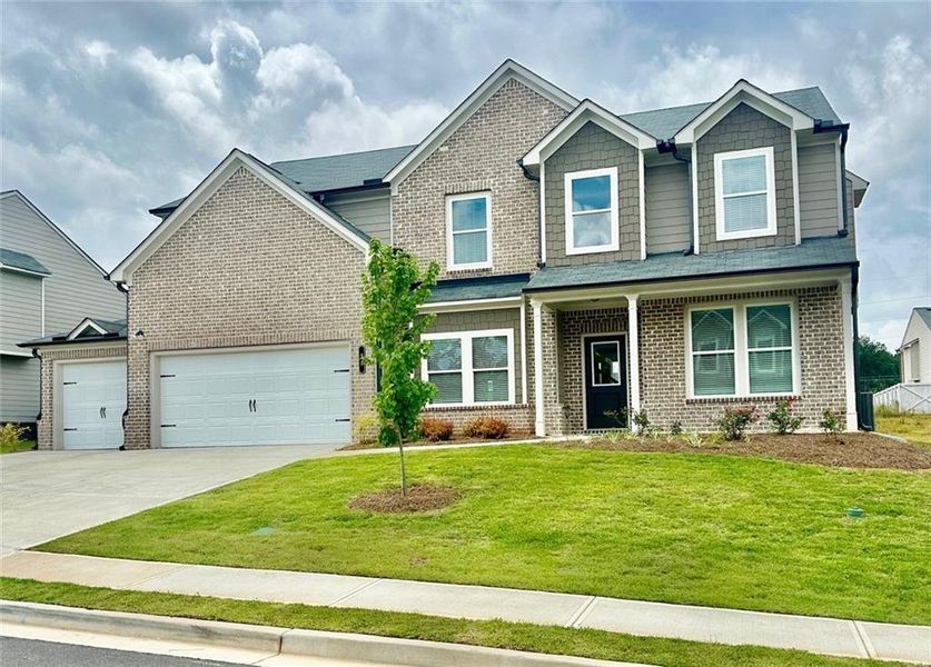 Front exterior of a new home in , Auburn, GA, highlighting curb appeal (Image 14). Front exterior of a new home in , Auburn, GA, highlighting curb appeal (Image 14).