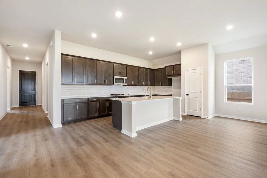 Furnished interior view inside a new home in The Colony 50s, Bastrop (Image 7).