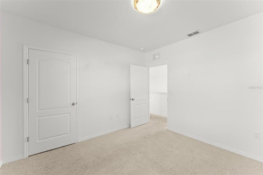 Spacious, unfurnished interior of a new home in Grace Ranch, Haines City (Image 37). Spacious, unfurnished interior of a new home in Grace Ranch, Haines City (Image 37).