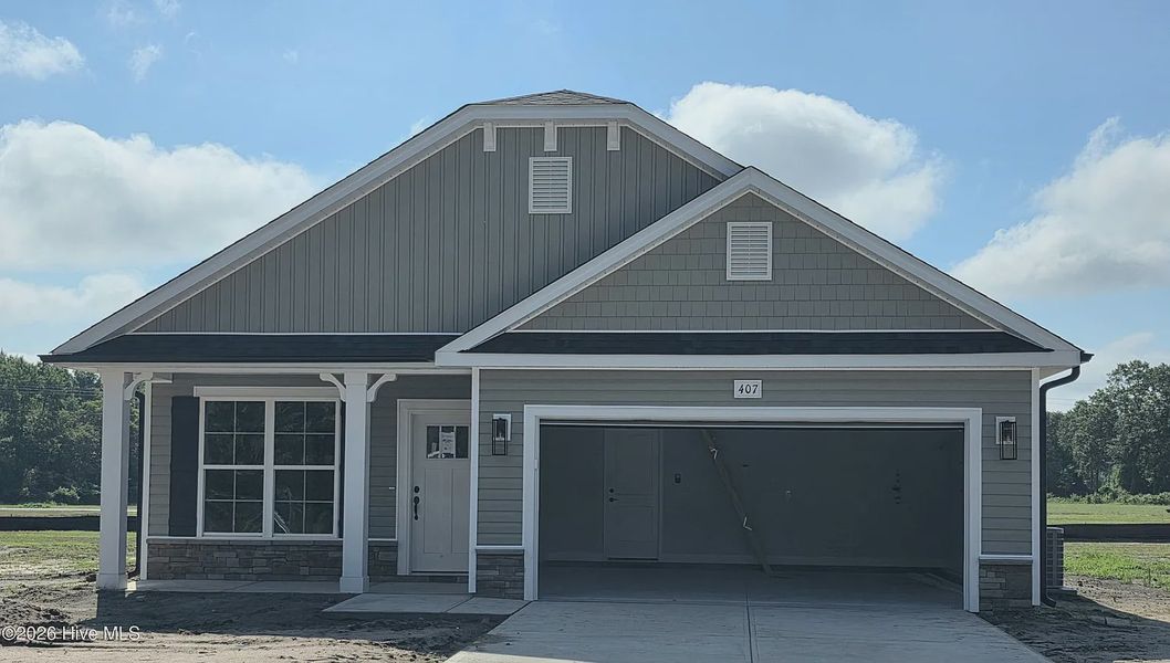 Front exterior of a new home in Blair Ridge, La Grange, NC, highlighting curb appeal (Image 1). Front exterior of a new home in Blair Ridge, La Grange, NC, highlighting curb appeal (Image 1).