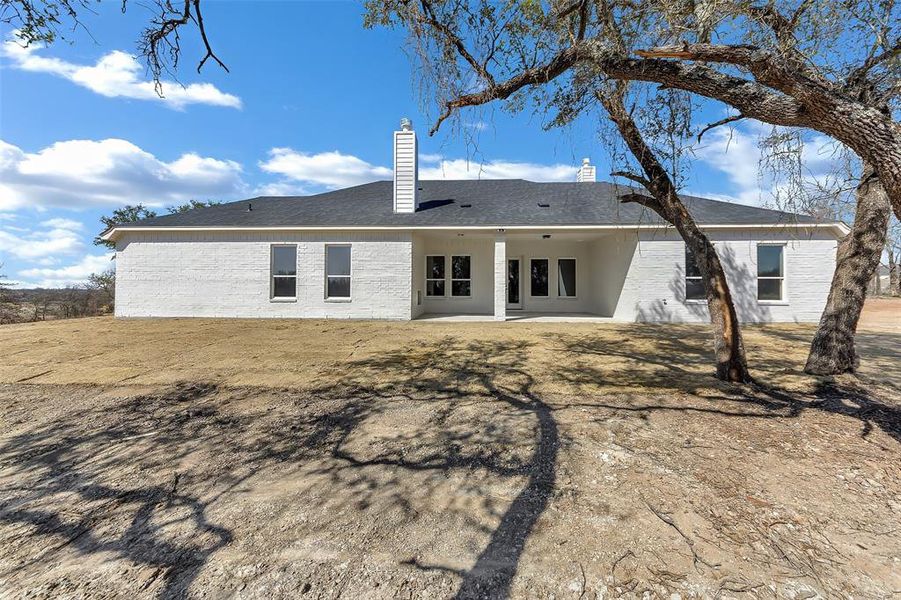 Exterior details and patio area of a home in , Poolville (Image 19).