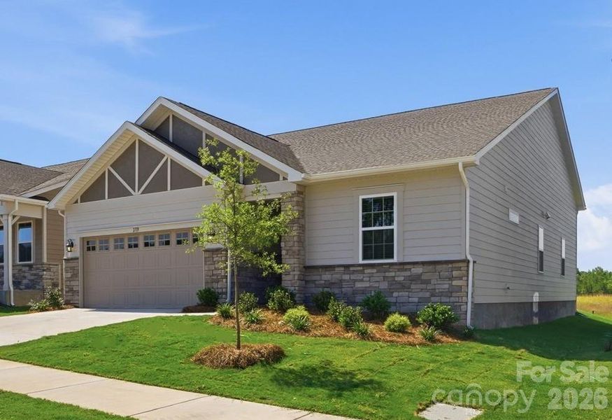 Front exterior of a new home in Westfall, Gastonia, NC, highlighting curb appeal (Image 2). Front exterior of a new home in Westfall, Gastonia, NC, highlighting curb appeal (Image 2).