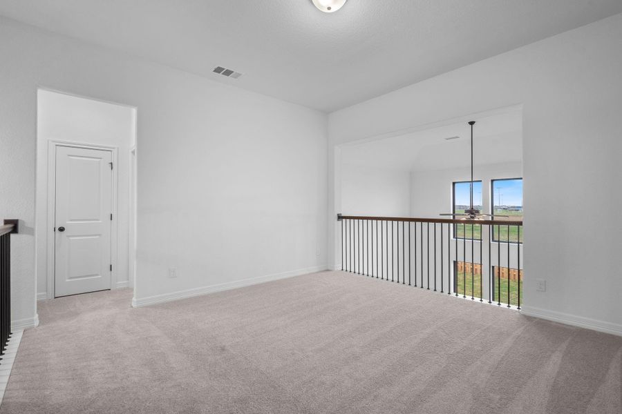 As you make your way upstairs this exceptional game room is a standout feature in this remarkable property, offering a space that combines luxury and fun for all ages.