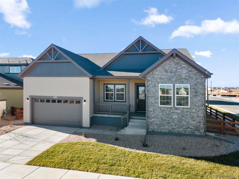Front exterior of a new home in Talon Pointe, Thornton, CO, highlighting curb appeal (Image 6).