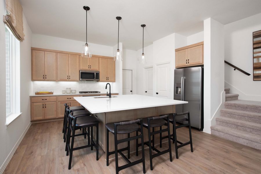 Representative furnished interior of a home built from the Wyatt by Ashton Woods in Collin Creek, Plano (Image 7).