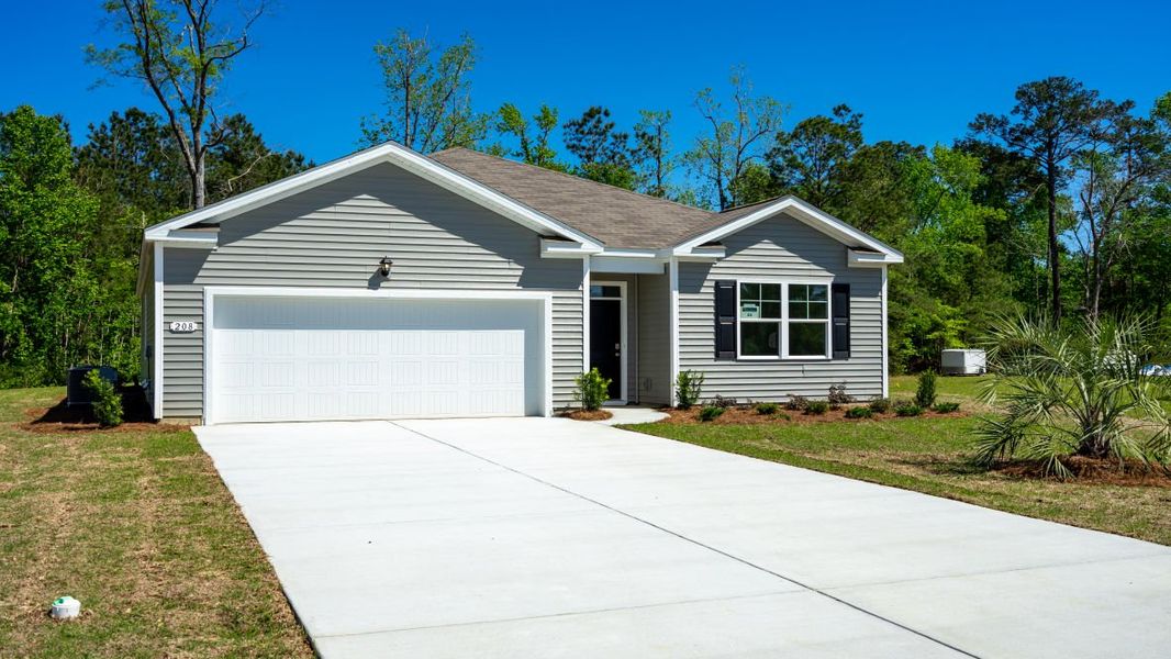 Representative exterior photo of a completed home built from the CALI by D.R. Horton in Ridgefield, Conway, SC (Image 1).