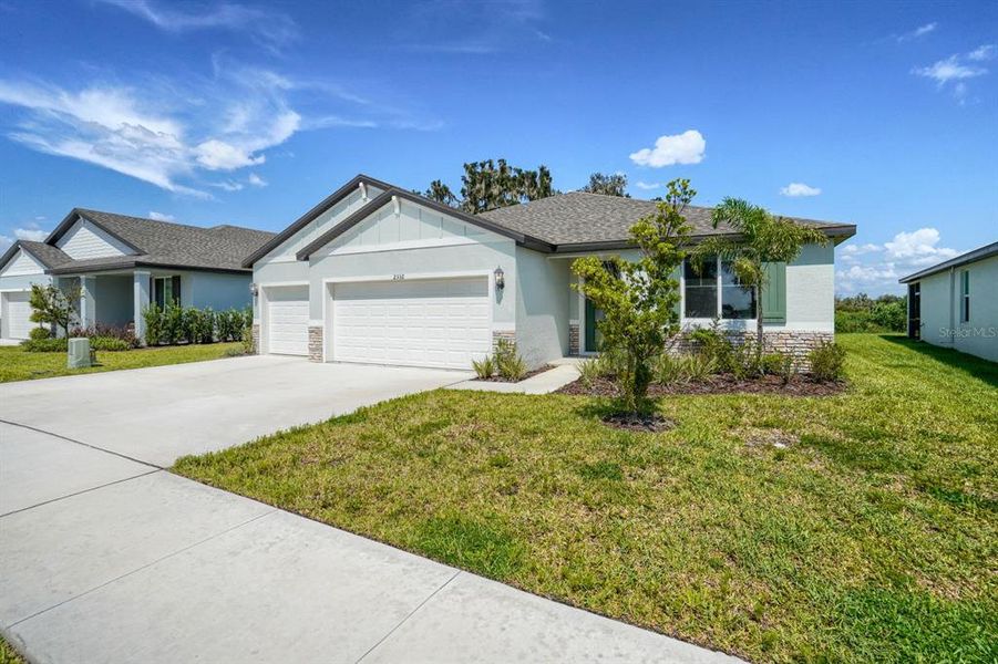 Front exterior of a new home in , Bartow, FL, highlighting curb appeal (Image 1). Front exterior of a new home in , Bartow, FL, highlighting curb appeal (Image 1).