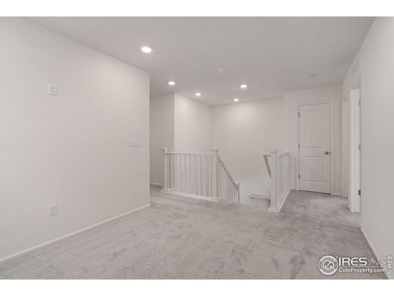 Second Floor Loft Area Provides Extra Space for TV, Game or Study Room