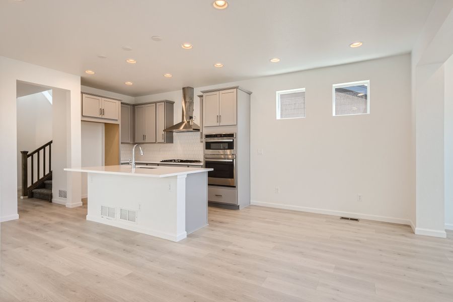 Furnished interior view inside a new home in The Aurora Highlands, Aurora (Image 11).