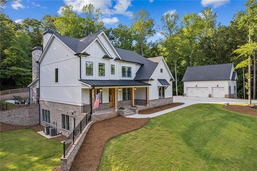 Front exterior of a new home in , Gainesville, GA, highlighting curb appeal (Image 2). Front exterior of a new home in , Gainesville, GA, highlighting curb appeal (Image 2).