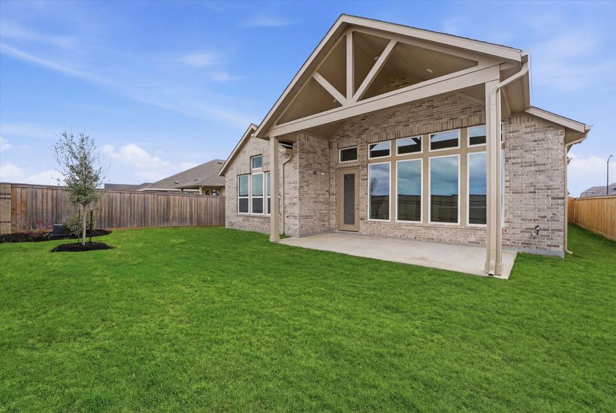 Exterior details and patio area of a home in Bridgeland, Cypress (Image 2).