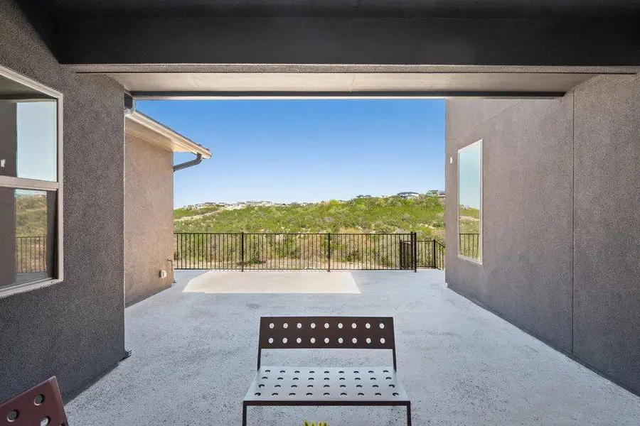Enjoy outdoor living from the covered courtyard and extended patio, designed to capture Lake Travis views.