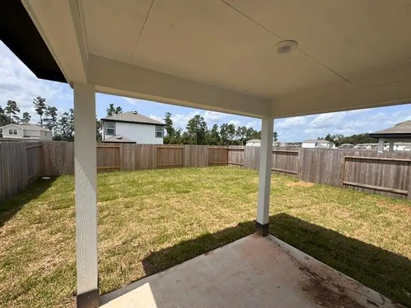 Exterior details and patio area of a home in Townsend Reserve, Splendora (Image 3). Exterior details and patio area of a home in Townsend Reserve, Splendora (Image 3).