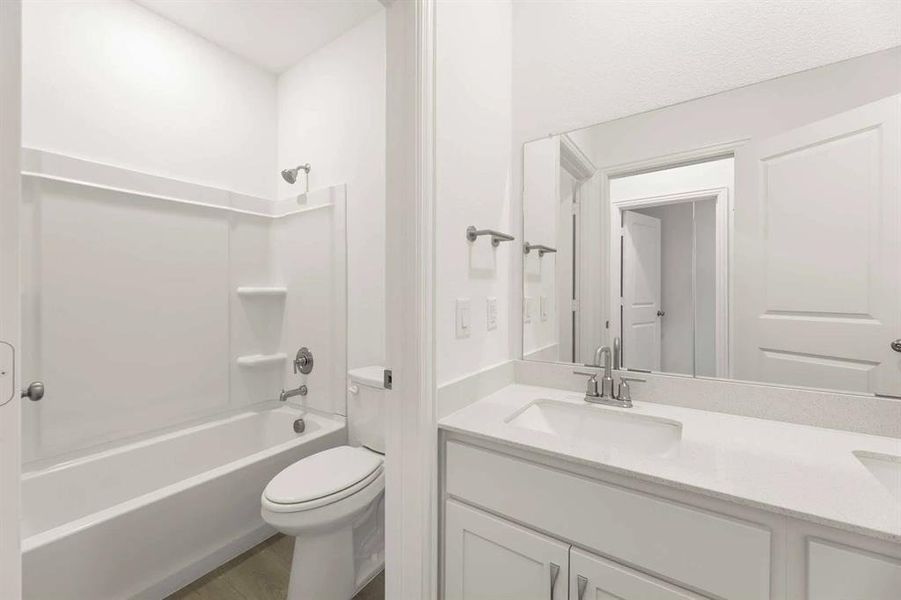 Furnished interior view inside a new home in Coyote Meadows, Anna (Image 6).