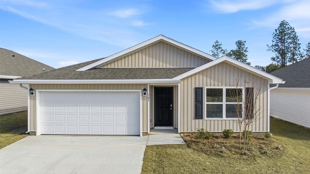 Front exterior of a new home in Magnolia at the Bluffs Phase 3, Freeport, FL, highlighting curb appeal (Image 1). Front exterior of a new home in Magnolia at the Bluffs Phase 3, Freeport, FL, highlighting curb appeal (Image 1).