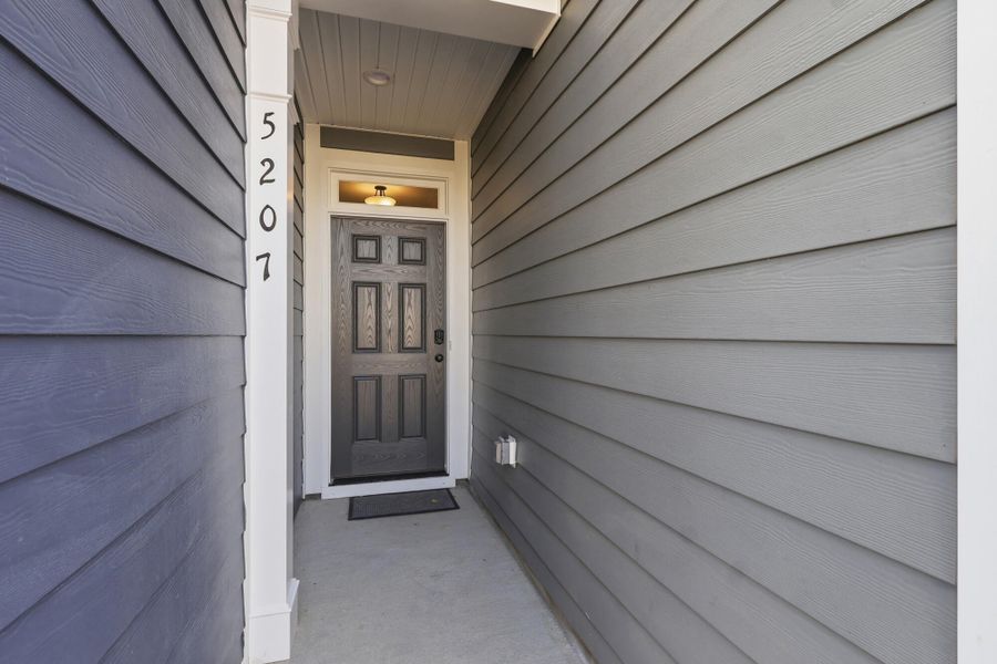 Exterior details and patio area of a home in Harbor Crossing, Greensboro (Image 3).