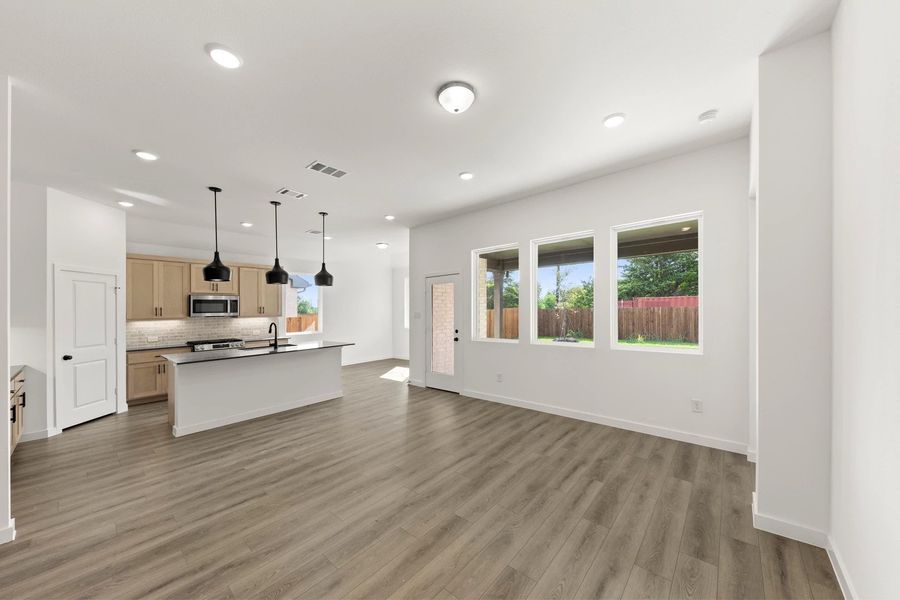Open Kitchen-Living-Dining Room featuring the Foundry Collection