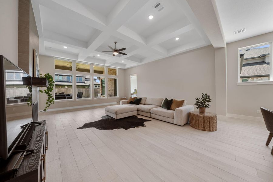 The spacious living room is a bright and inviting space, designed for both relaxation and entertaining. The spacious living room is a bright and inviting space, designed for both relaxation and entertaining.