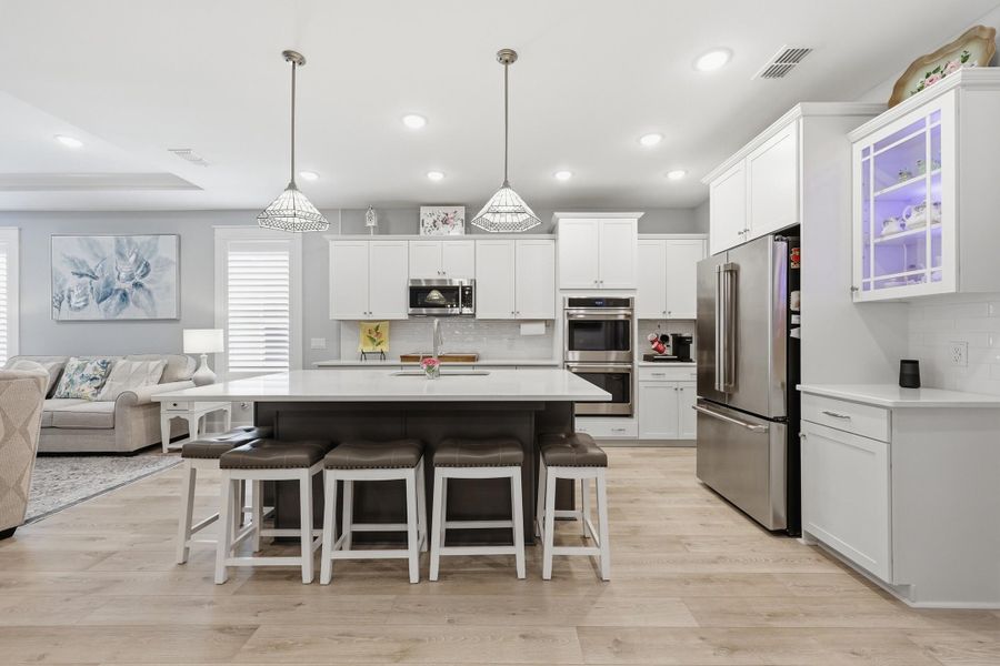 Furnished interior view inside a new home in K. Hovnanian's® Four Seasons at Lakes of Cane Bay, Summerville (Image 12).