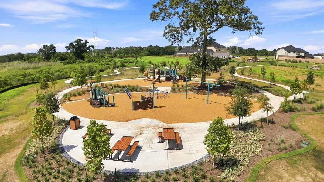 Community area with picnic tables and a park. Community area with picnic tables and a park.