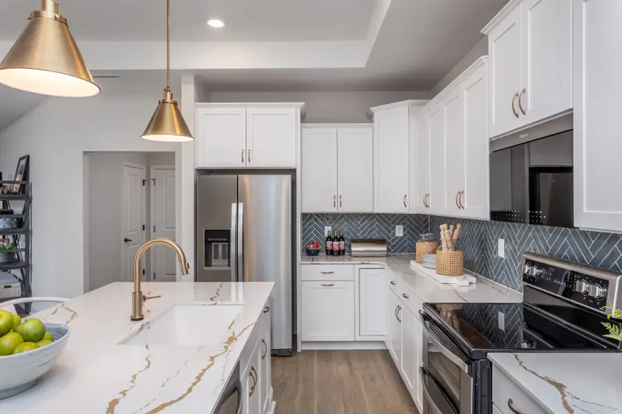 Representative furnished interior of a home built from the Promenade by McKee Homes in The Cottages at 78 North, Sanford (Image 8).