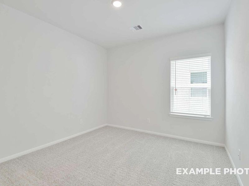 Spacious, unfurnished interior of a new home in Caney Creek Place, Conroe (Image 24).