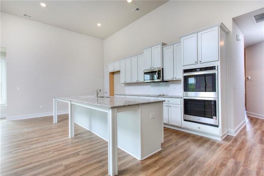 Furnished interior view inside a new home in , Homer (Image 8).